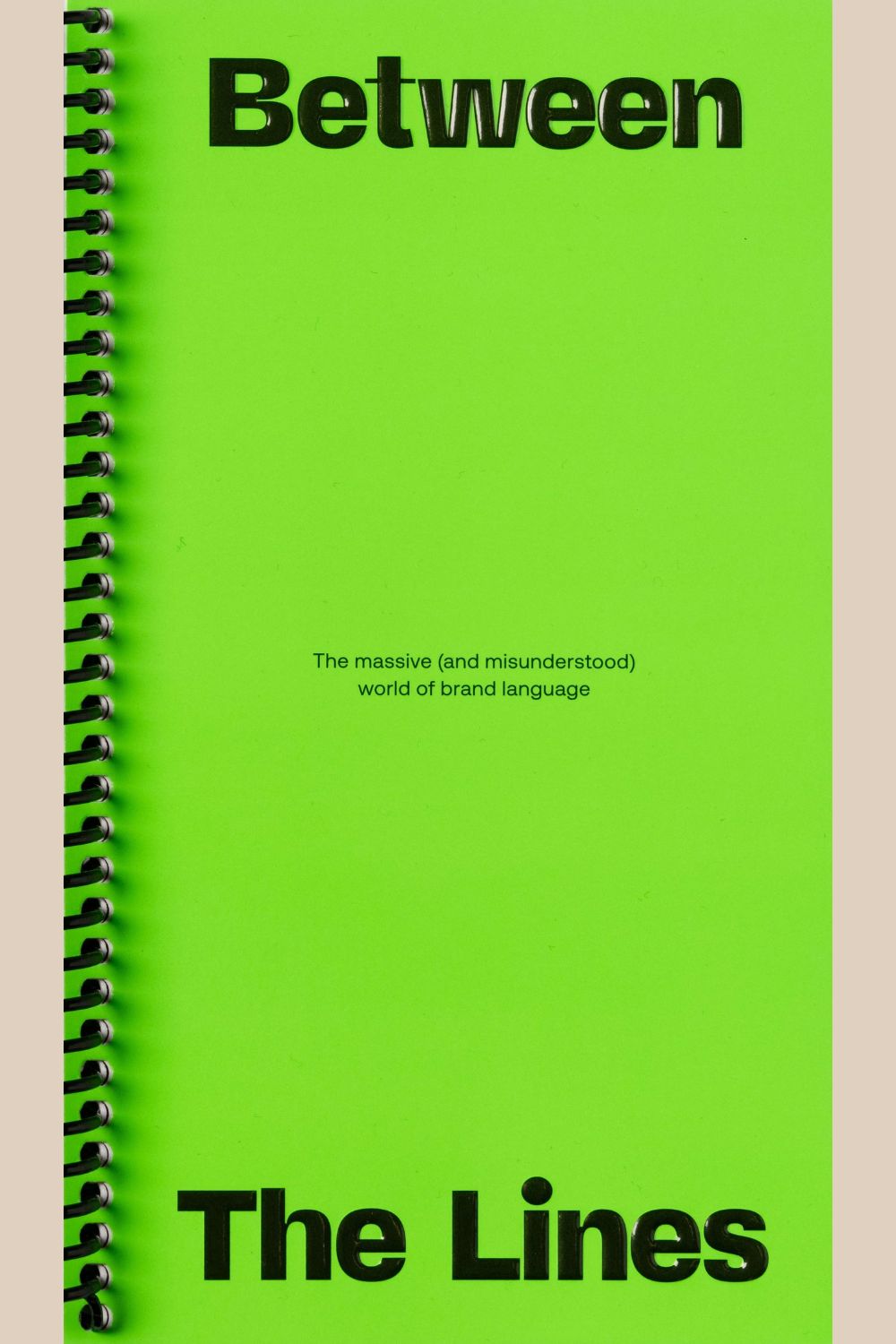 Between The Lines Magazine Issue 1 cover. (lime green background with black text).