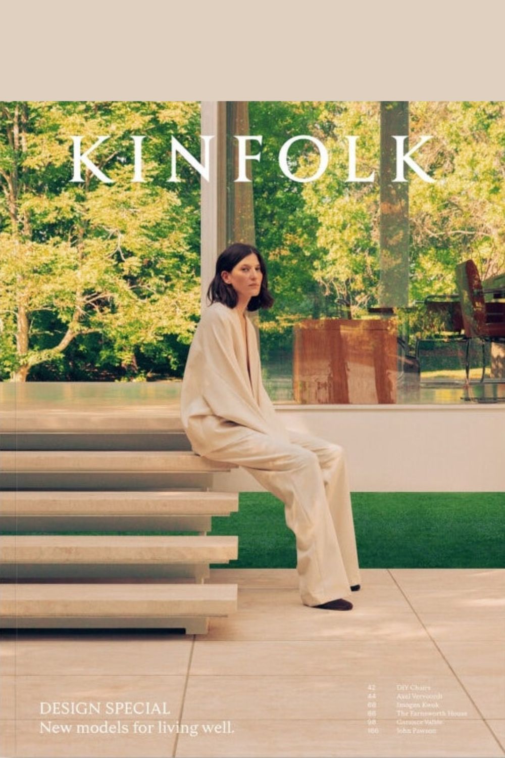 Kinfolk cover issue 51 with woman sitting on elegant stone steps
