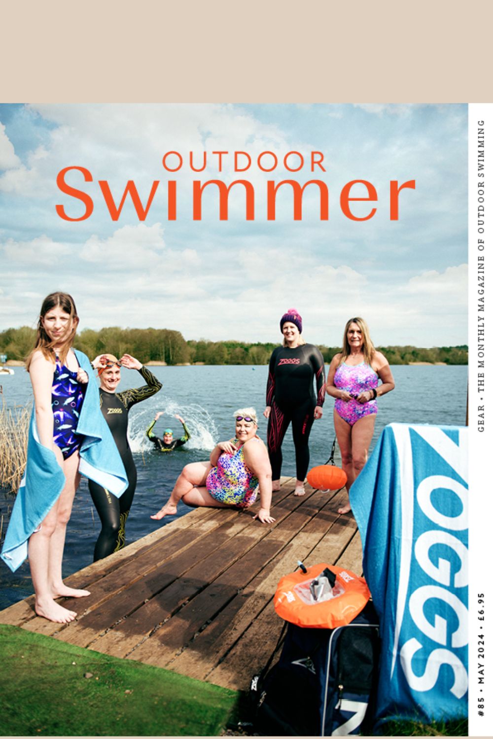 Outdoor Swimmer May 2024 cover (swimmers on a jetty)