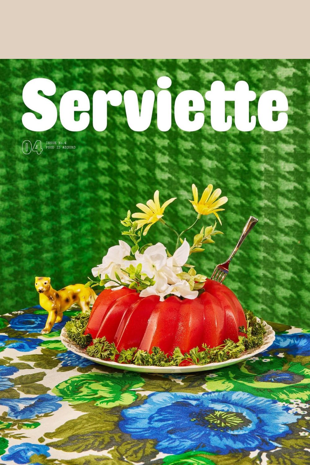 Serviette Magazine cover Issue 4 (red jello with parsley against green tweed background)