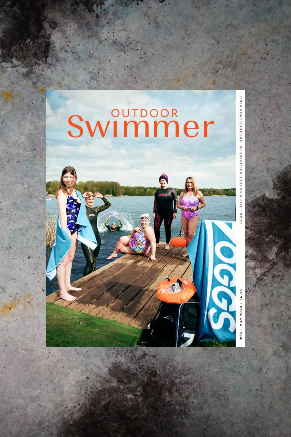 Outdoor Swimmer May 2024 cover (swimmers on a jetty)
